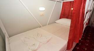 Хостел Хостел СарХаус Саратов Спальное место на двухъярусной кровати в общем номере для мужчин и женщин-1